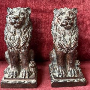 Vintage lion bookends heavy (concrete?). Painted copper look.
